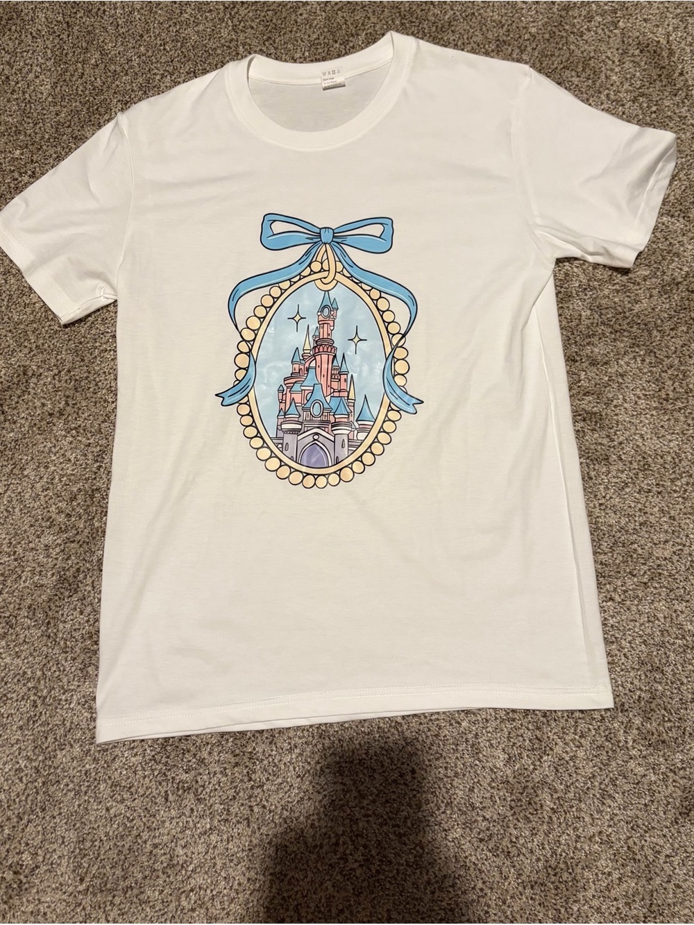NWOTS Womens White Graphic Tee with Blue Bow and Castle Print